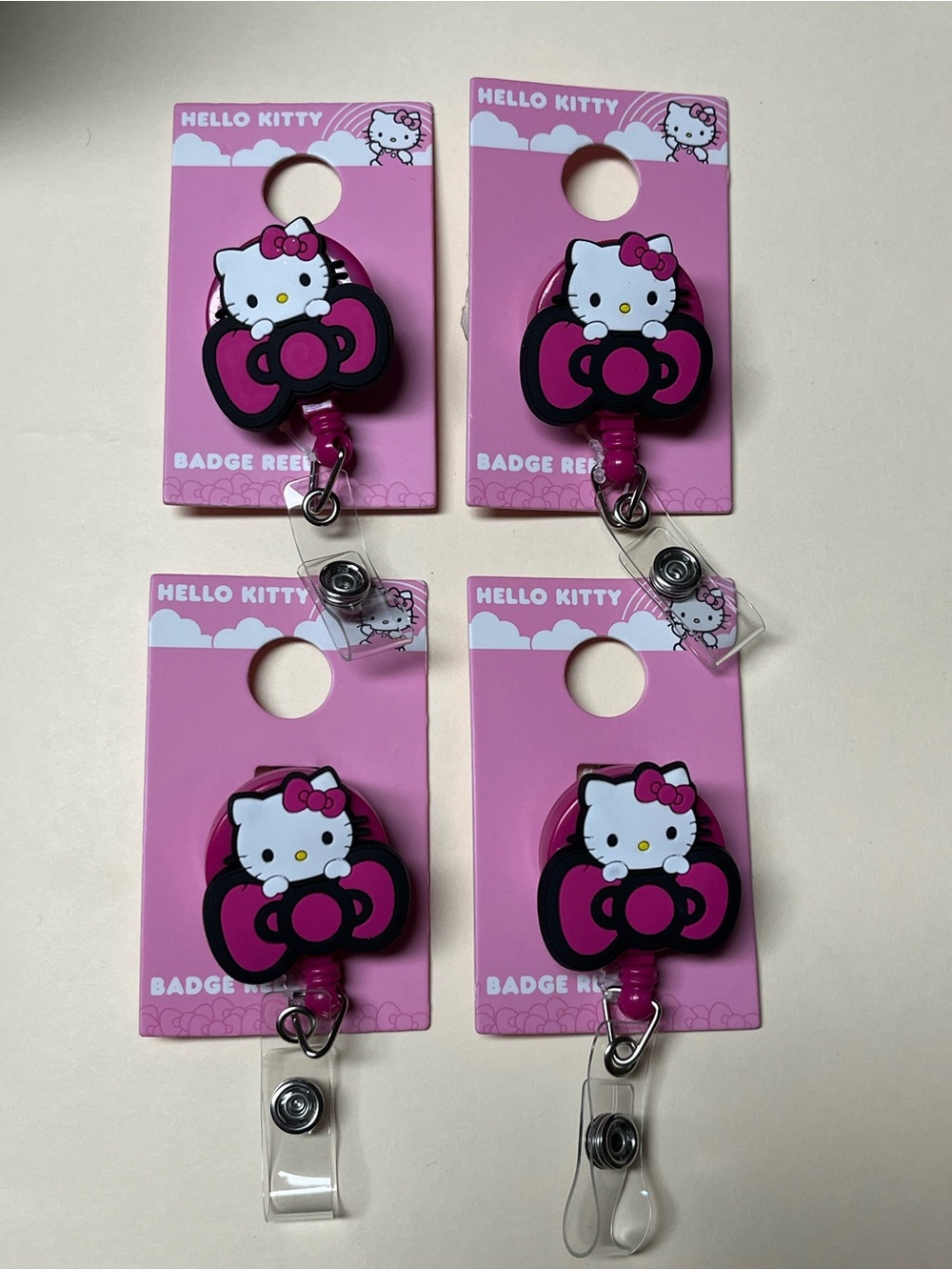 Hello Kitty Pink Badge Reels x4
